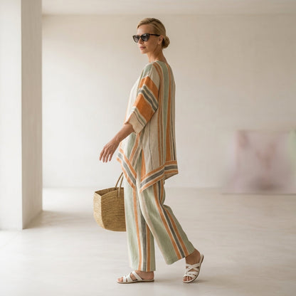 Elisabetta – top asimmetrico elegante con pantaloni a gamba larga