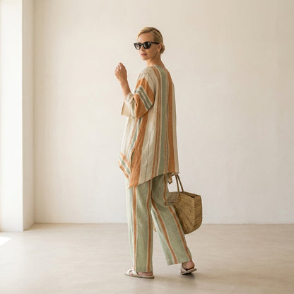 Elisabetta – top asimmetrico elegante con pantaloni a gamba larga