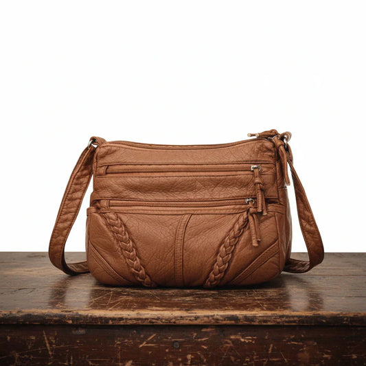 Shoulder bag with interwoven details
